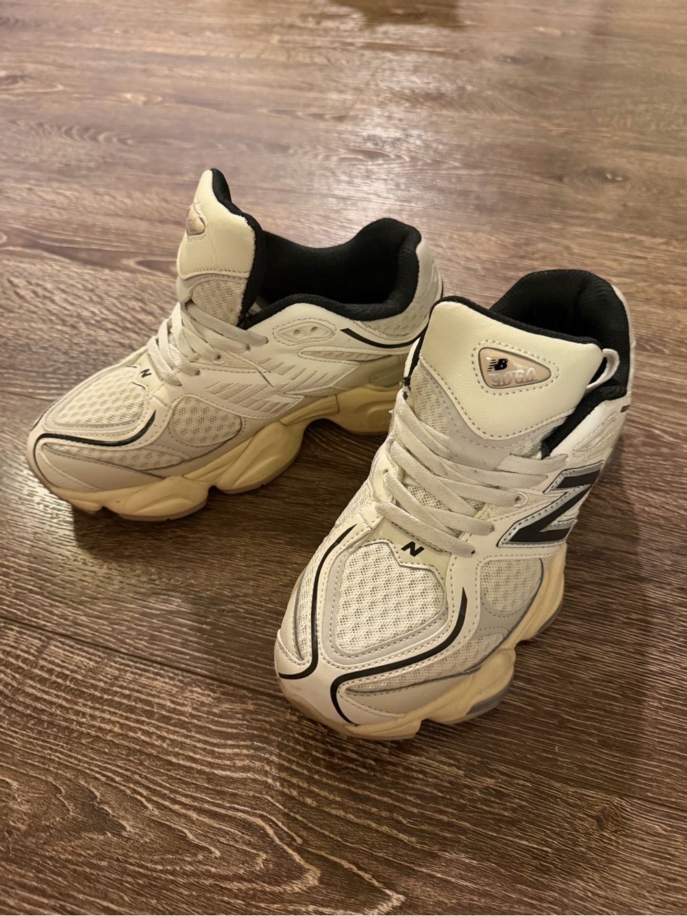 New Balance Cream White and Black Athletic Sneakers